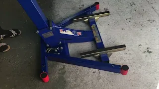 Big blue bike lift Eazyrizer with ball caster roller transfer bearing.