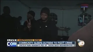 Community sleeps outside to fight crime