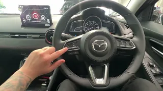 Mazda2 - How to use the steering wheel buttons and Cruise Control
