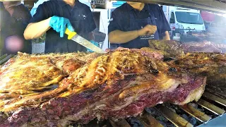 Street Food Festival in Italy. Grilled Meat, 'Porchetta', 'Lampredotto', Pork Legs, Loin, Sausages