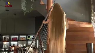 Beautiful blonde angel with extremely long beautiful hair climbing stairs❤️❤️❤️