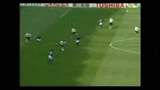 Michael Owen scores against Brazil