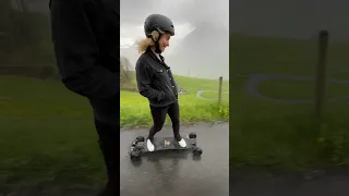 Electric skateboard caught in a sudden rainstorm