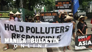 Protesters call for an end to fossil fuels