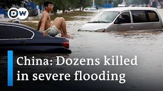 Deadly flooding paralyzes Henan province in China | DW News