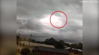 'God' appears to walk across sky between clouds in Alabama