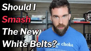 Should You Mercilessly Smash New White Belts or Let Them Work in BJJ?