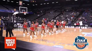 WSSU Powerhouse and Lincoln U cheer knuck and buck at center court