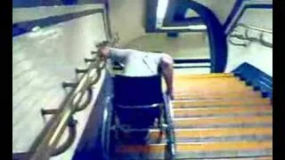Wheelchair on the Tube Station Stairs