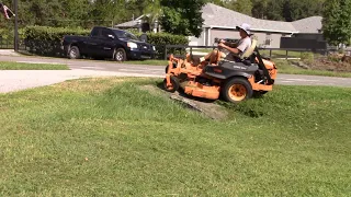 Scag Cheetah mows a big one! Get popcorn!