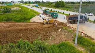 Great Landfill up by Komatsu Bulldozer Clearing Soil with Dump Truck Unloading Soil in Processing