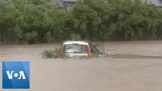 Japan Floods: Heavy Rains Flood Streets, Rivers