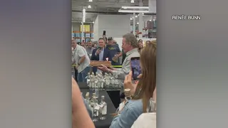 'Breaking Bad' actors Bryan Cranston and Aaron Paul sling mezcal in Mission Valley Costco