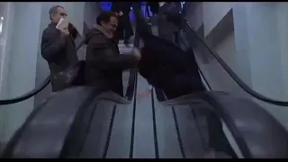 Steven Seagal throws a man onto an esculator - The Foreigner (2003)