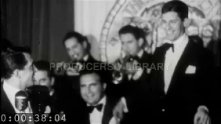 Dean Martin and Jerry Lewis performing at the Photoplay Awards Dinner