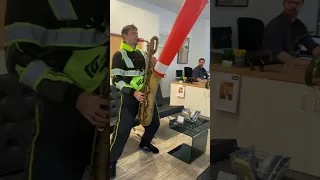 Playing my new song, “Construction Sax” in a German office #sax #prank #trafficconesaxophone