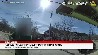 Cleveland police bodycam shows moments after man escapes alleged kidnapping while avoiding gunsho...