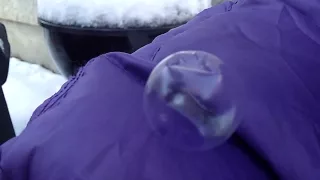 So cold a bubble freezes in midair