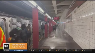 Subway platforms flooded as heavy rain soaks morning commute