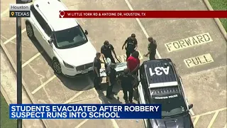 Carjacking suspect runs into school after chase ends in crash, police say