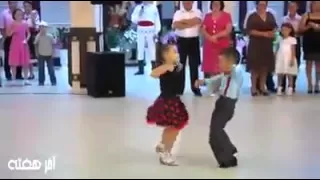 Cute kids dancing at a wedding