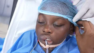 African Girl Scared Crying Pushing Doctors before Surgery
