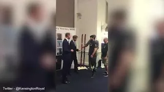 Prince HAIRY meets his match! Harry jokes around as he lifts double amputee veteran's beard to prese