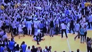 North Carolina fans rush court and slip after beating Duke