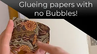 Glue collage papers without bubbles with Kasia Avery