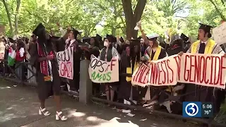 Students walk out during Yale graduation ceremony