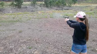 My daughter and the Sig P220 Stainless Elite 10mm, KrypTek.