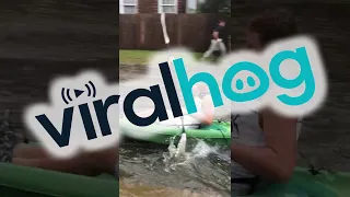 Kayaker Keeps Afloat During Flood || ViralHog