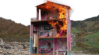 Barbies burning in dollhouse