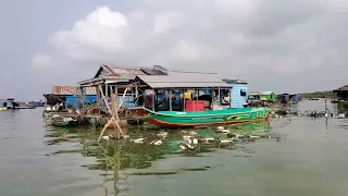 Tonlesap lake of Cambodia, Floating villagees, floating houses.