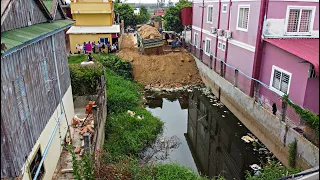 Complete100% Filling Land by Bulldozer push soil​​ into water with 5ton Trucks