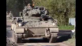 Following a convoy of armoured vehicles at Salisbury plain