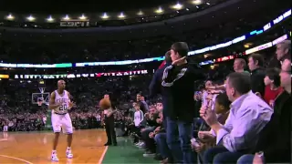 LeBron James dives on a Celtics fan