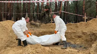 Ucrânia encontra centenas de sepulturas perto de cidade reconquistada | AFP