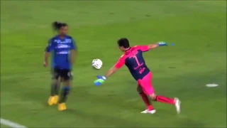 Ronaldinho takes the ball from the goalkeeper‬