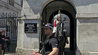 Incredible Footage: Brave New Police Officer Saves the Day During Guards' Change Over Chaos!"