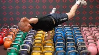 Sergey Rudnev - acrobatic and power juggling show with the kettlebells