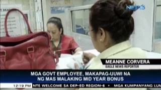 Government employees to bring home larger mid-year bonus