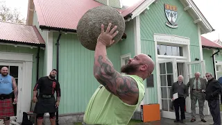 Three of the Worlds Strongest Men lift and press the famous 260lbs Scottish Inver Stone at Braemar