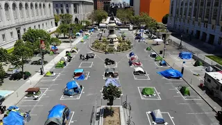 Virus prompts city to okay tent camps for homeless