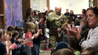 Father Returning From Deployment Surprises Children