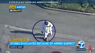 Man with gun at Santa Ana parking lot prompts major police response