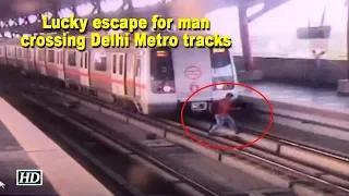 Lucky escape for man crossing Delhi Metro tracks