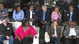 A diverse group of Americans speak to Frank Luntz during focus group