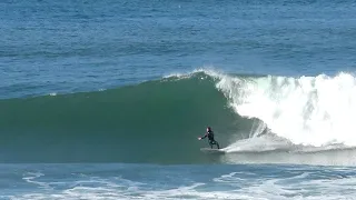 Surfers ride Big Waves at Huntington Cliffs and Seal Beach