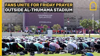 Fans unite for Friday prayers outside Al Thumama Stadium